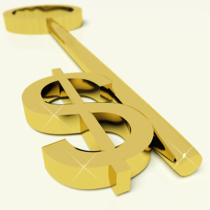 Key With Dollar Sign As Symbol For Money Or Wealth